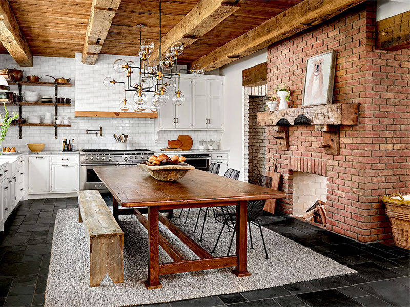 Farmhouse kitchen with brick wall